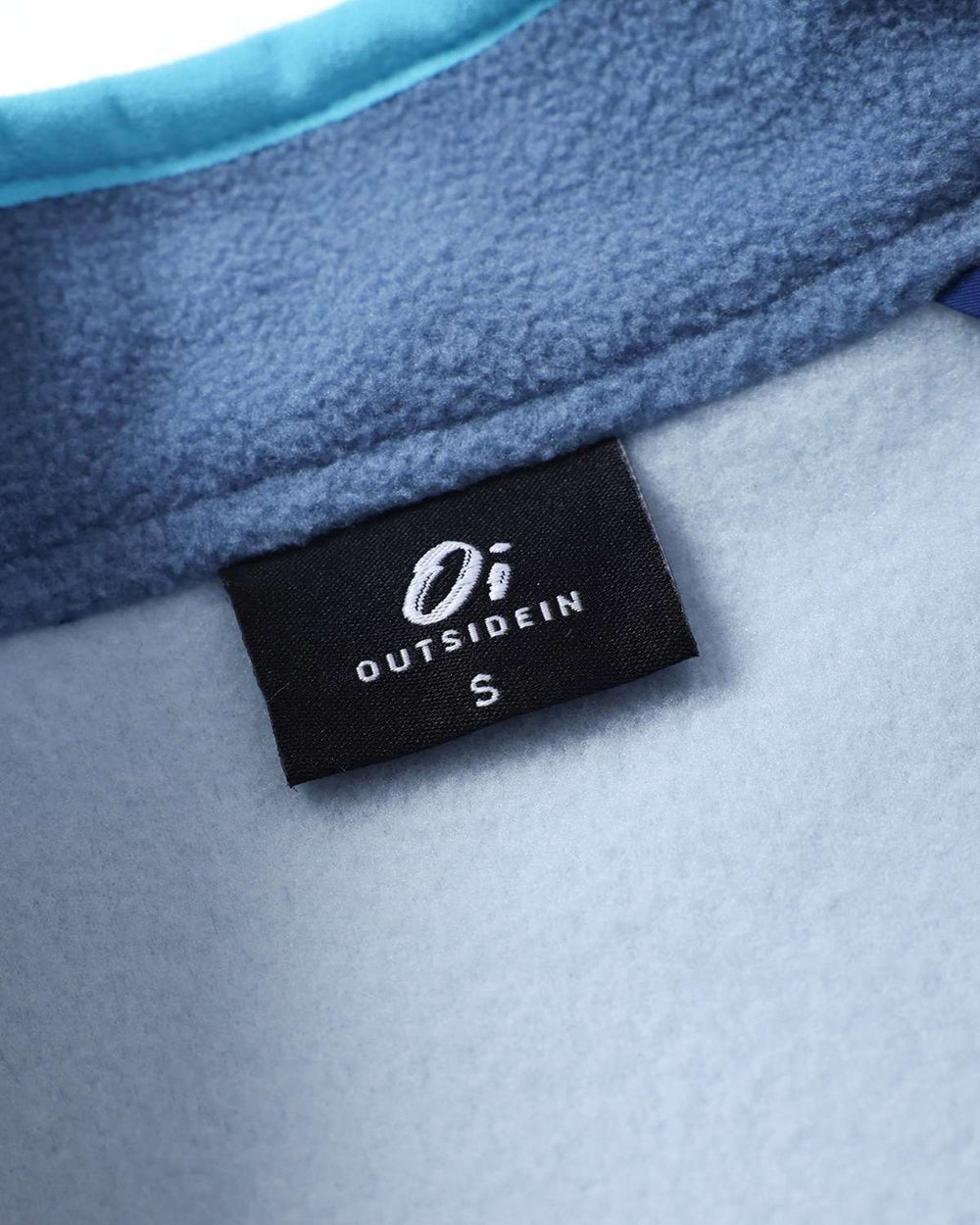Lightweight fleece jacket size label tag inside collar, outsidein branding