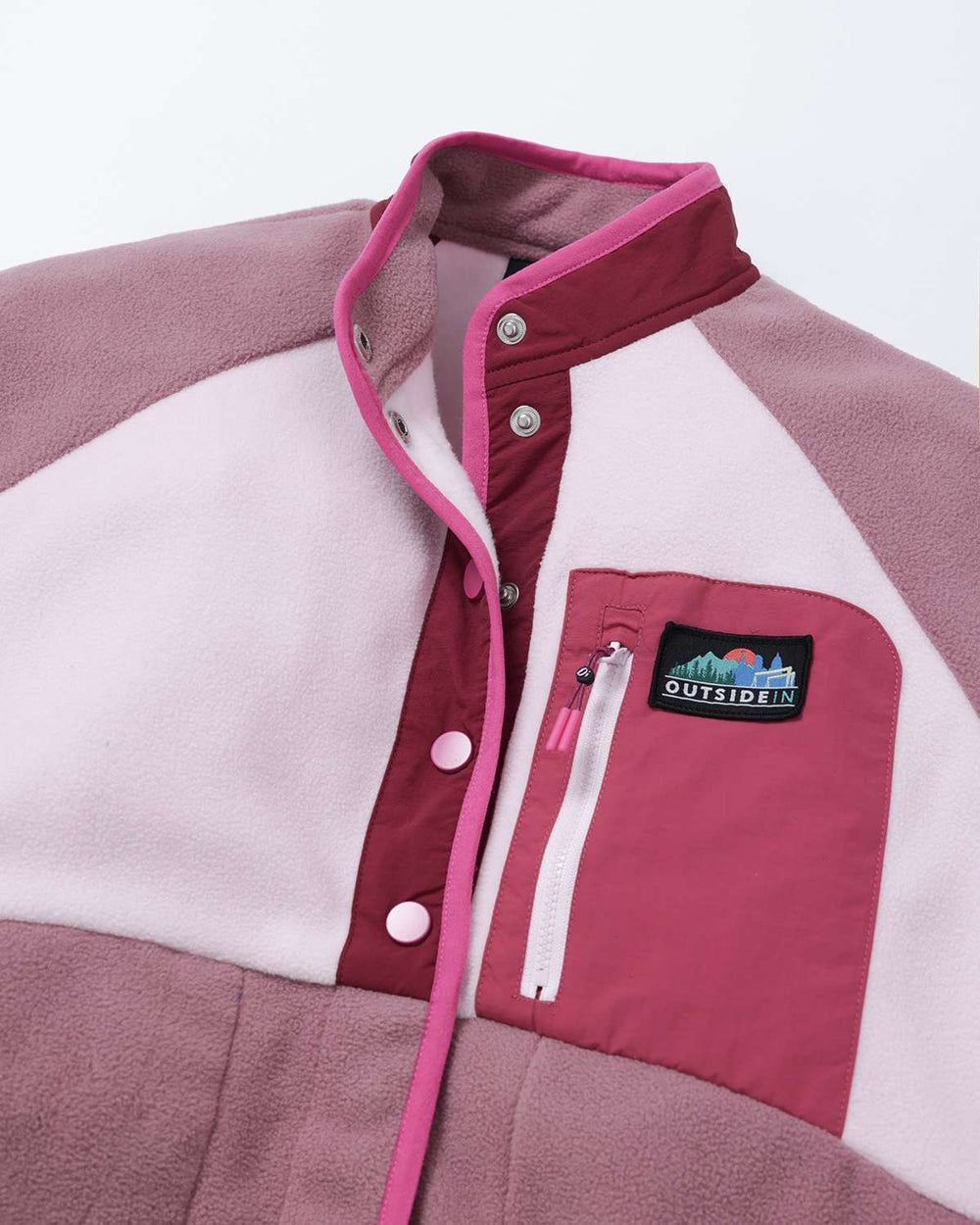 Color-block fleece jacket with snap placket, chest pocket, and logo patch