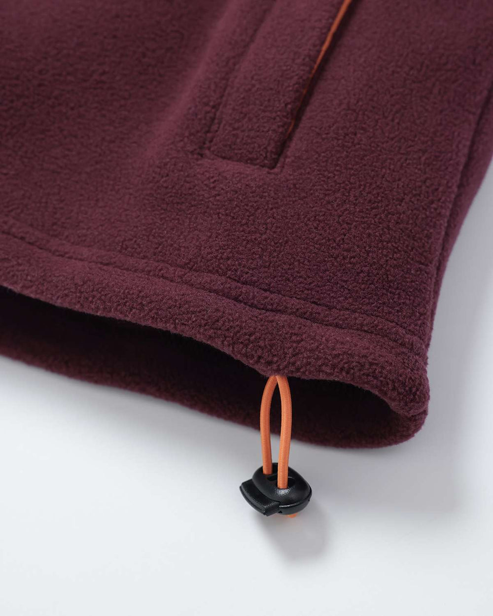 Burgundy fleece hem with adjustable drawcord toggle and elastic cuff