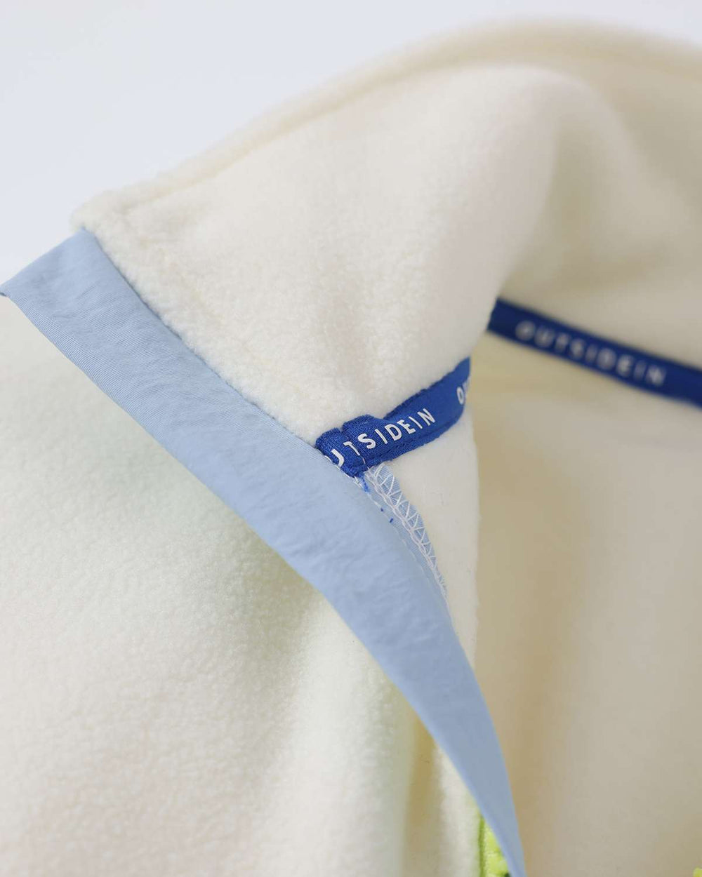 Microfleece collar and shoulder seam with OutsideIn neck tape in blue