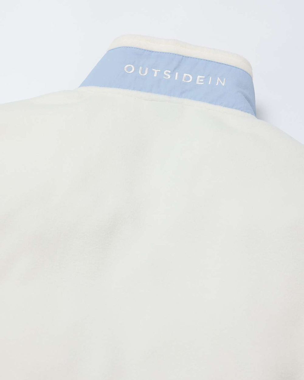 Cream microfleece collar with OutsideIn text tape