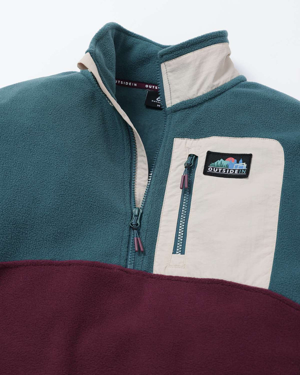Microfleece quarter-zip jacket, teal with white chest panel, high collar and zipper details