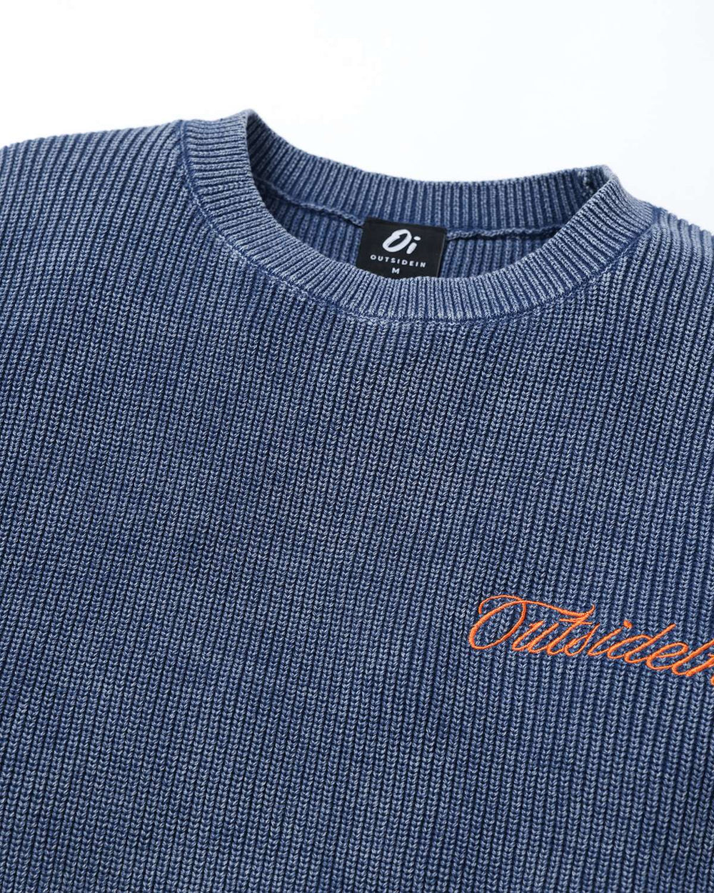 Blue crewneck rib knit sweater with orange embroidered logo on chest