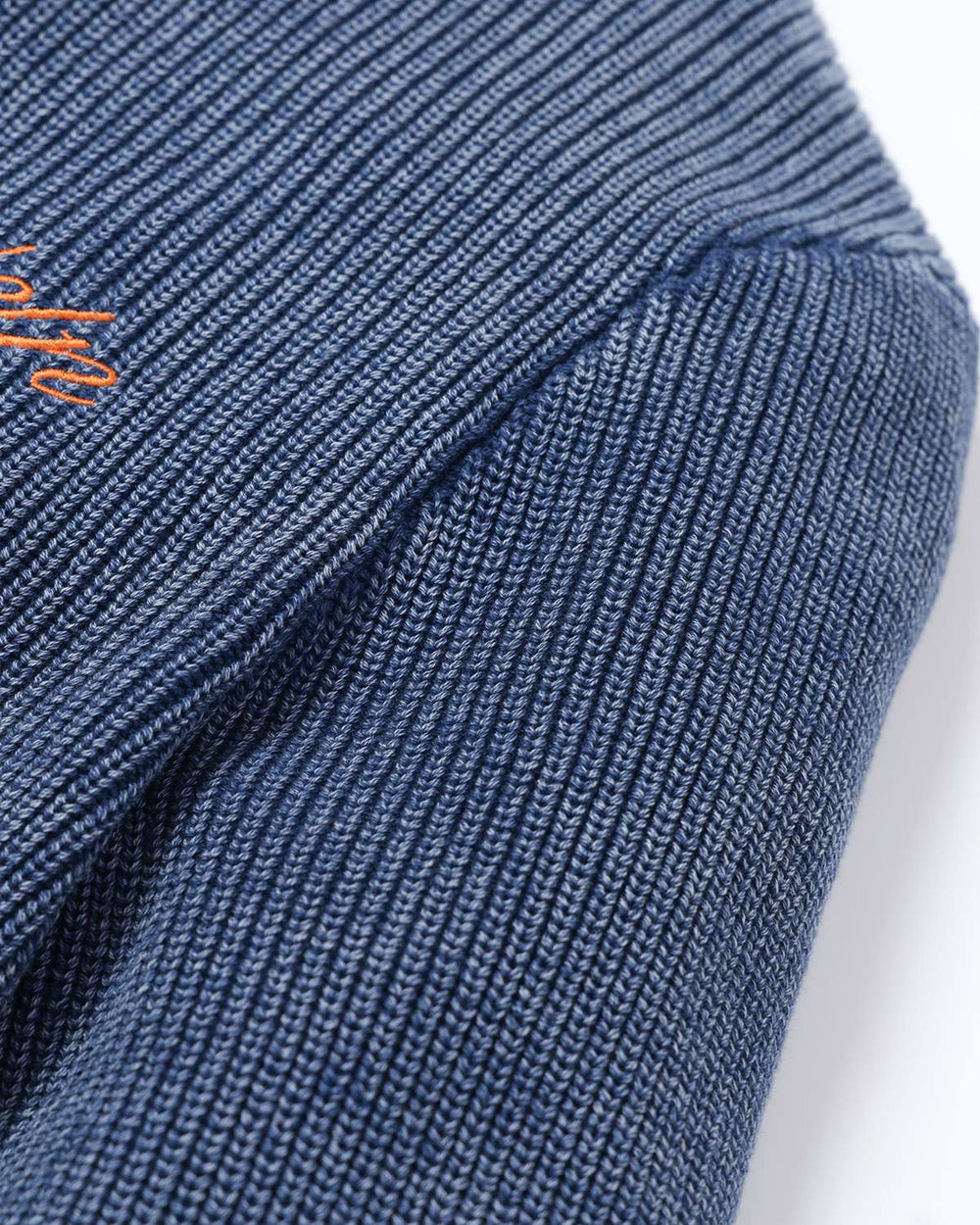 Blue rib knit sweater sleeve with ribbed cuff and side seam detail