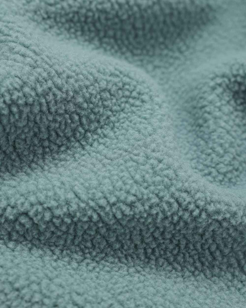 Teal borg fleece button-up fabric texture, soft sherpa-like pile