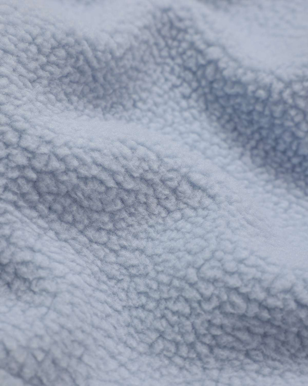 Light blue borg fleece button-up shirt fabric texture