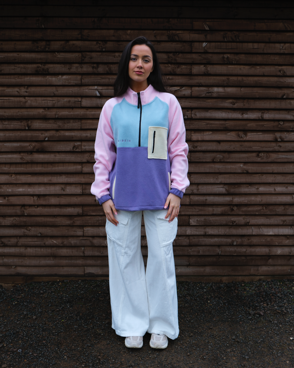 Person wearing Petal Bloom Pocket Fleece 1/2 zip, lightweight outdoor fleece jacket