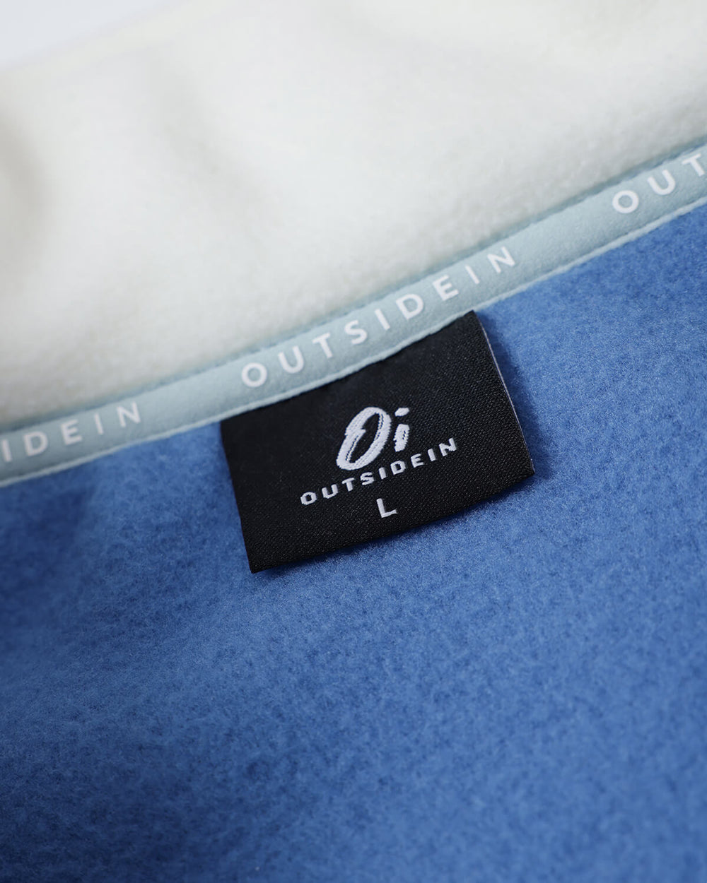 Blue & Orange Signature Pocket Fleece Label