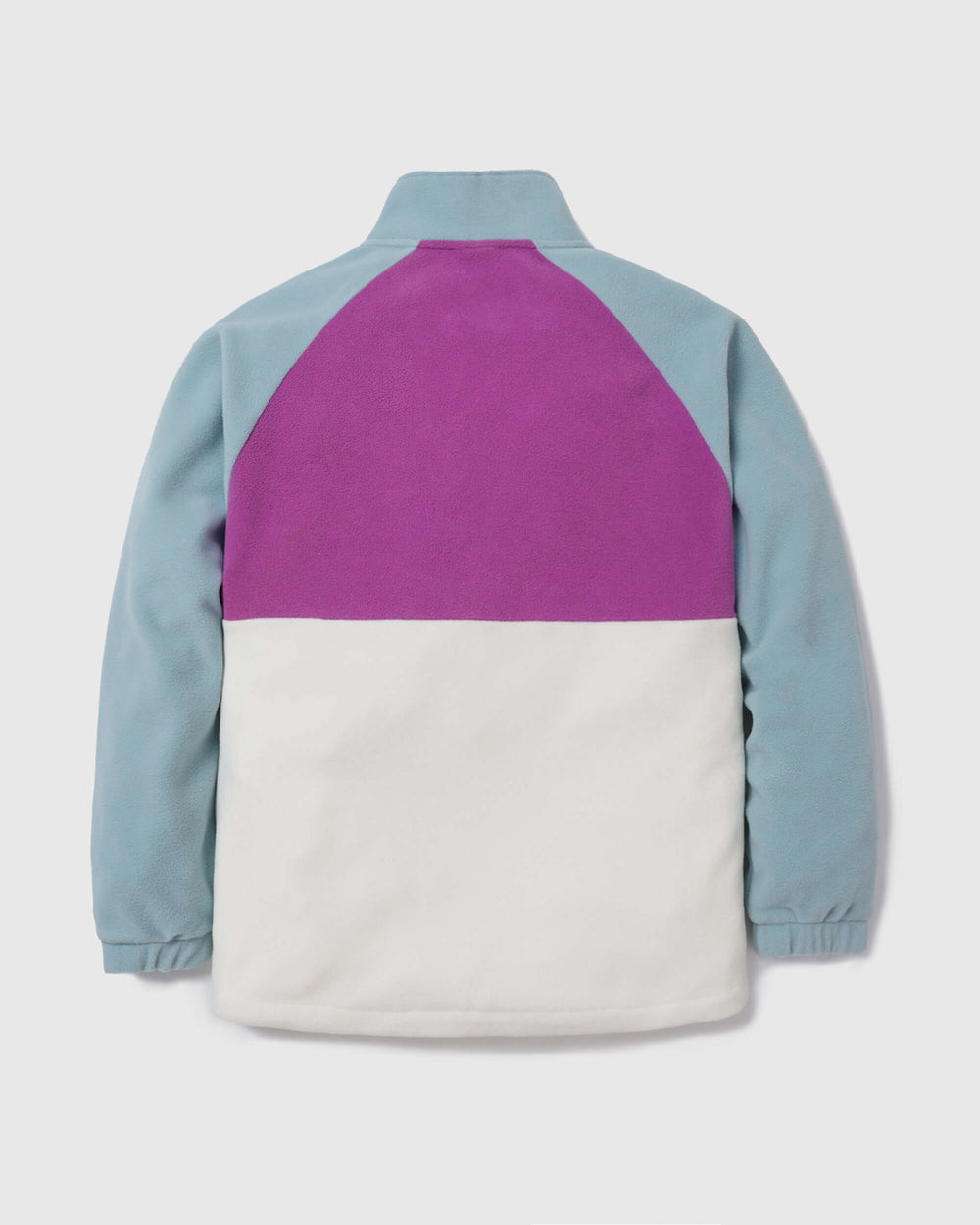 A colour block fleece shown from the back, featuring a light blue body, a magenta-purple upper back panel, and an off-white lower back panel, set against a light grey background.