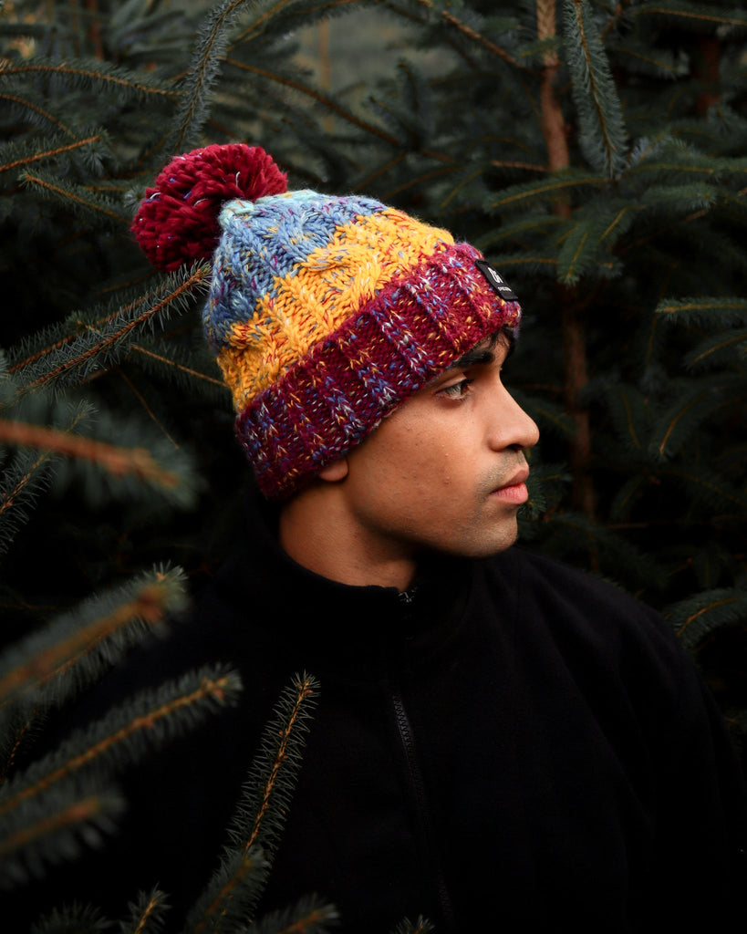 Book Club Pom hat with partial faux shearling lining and acrylic knit