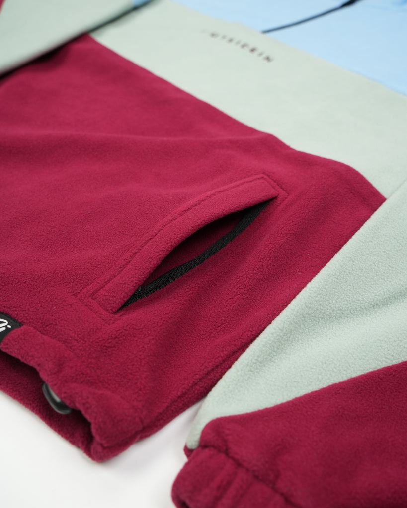 Blue Sage Band Fleece with panelled design, toggle fastening, and cosy pockets