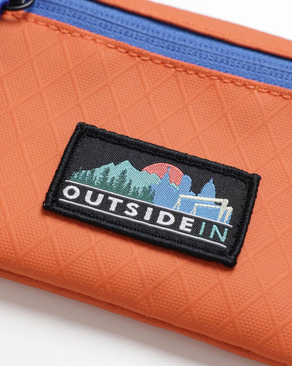 Close up of OutsideIn Burnt Orange Flat Pouch