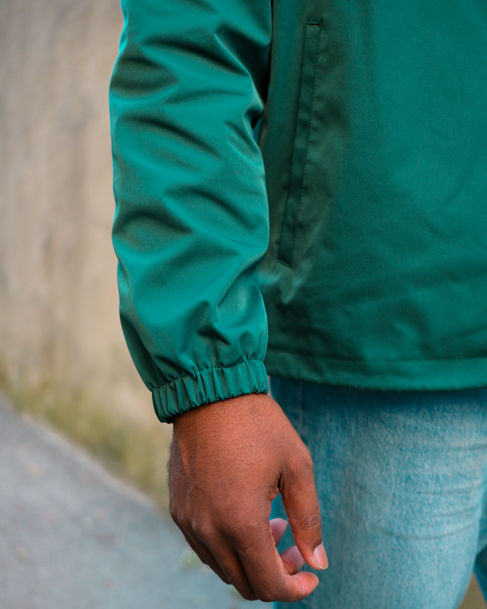 Close-up of Outside In coach jacket wrist fitting