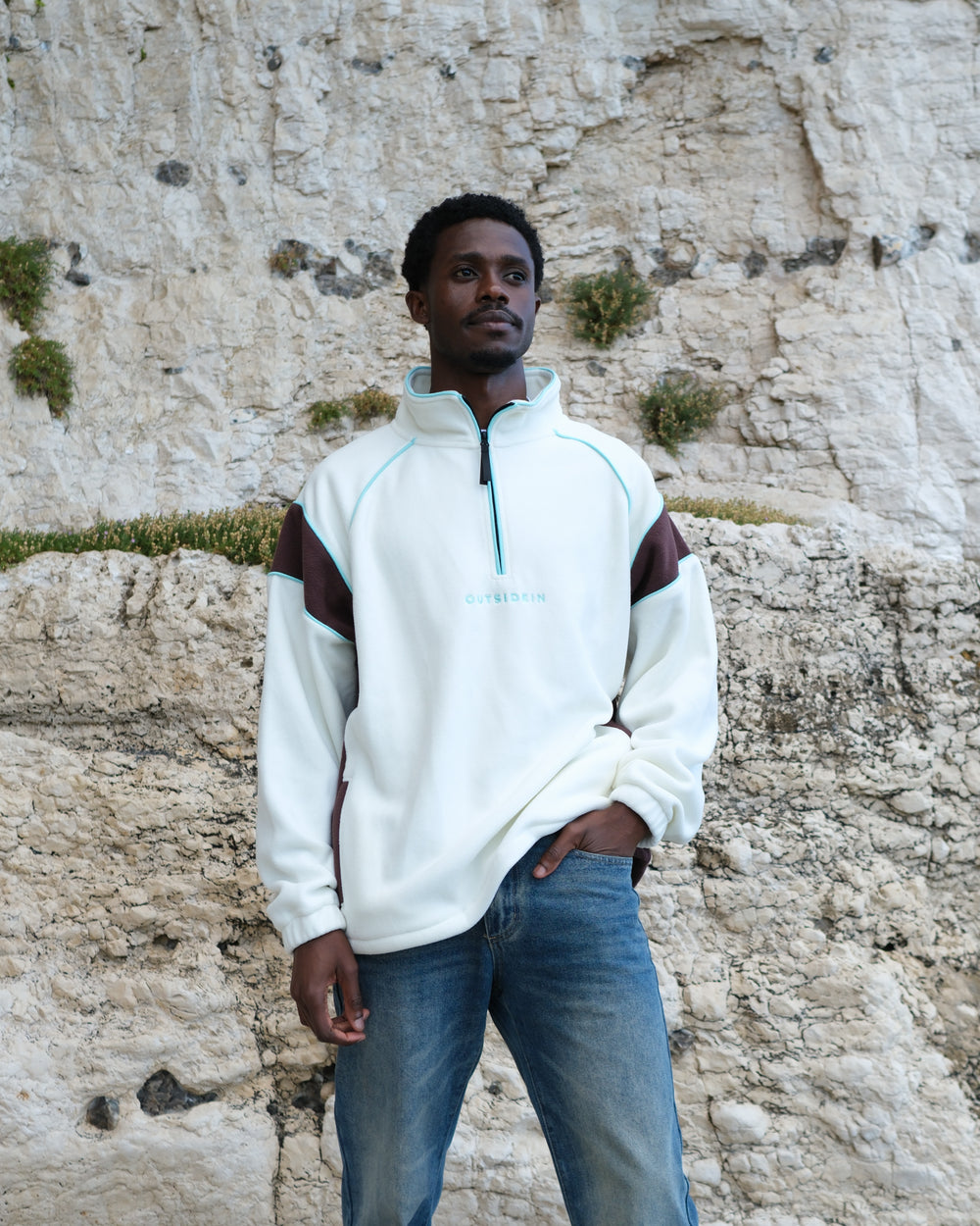 Man wearing OutsideIn Cream Canyon Quarter Zip Fleece
