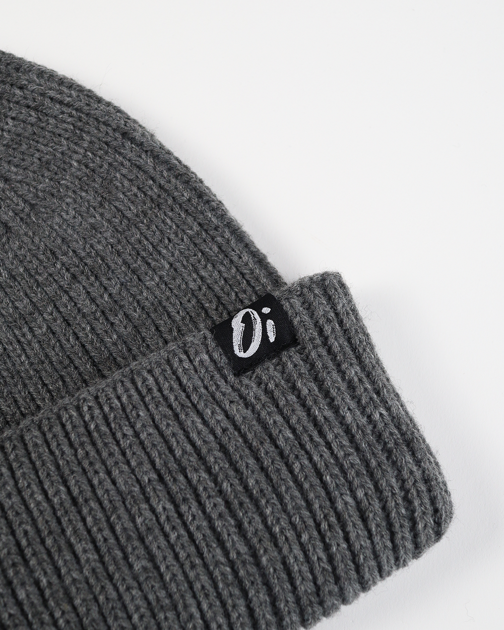 OutsideIn Dark Grey ribbed beanie hat, knitted winter cap, unisex colourful accessory.