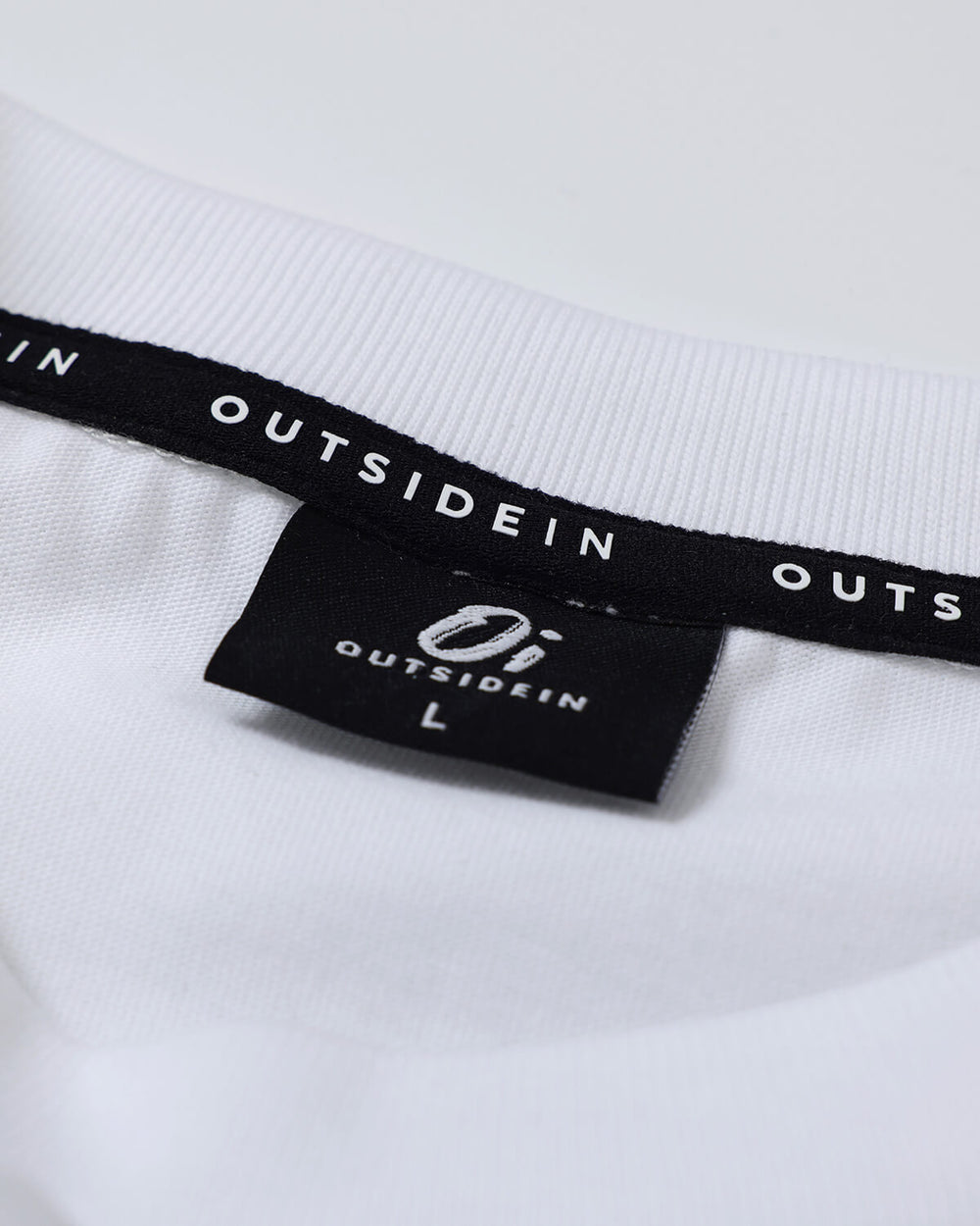 OutsideIn For The Outsiders White T Shirt Neck Label