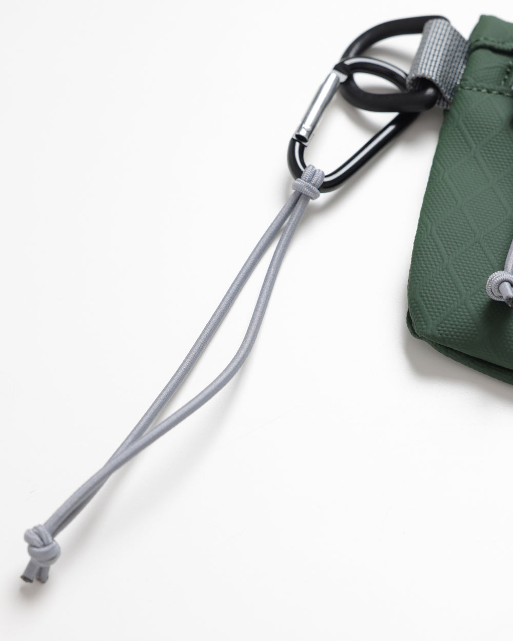 Close up of OutsideIn Forest Green Flat Pouch