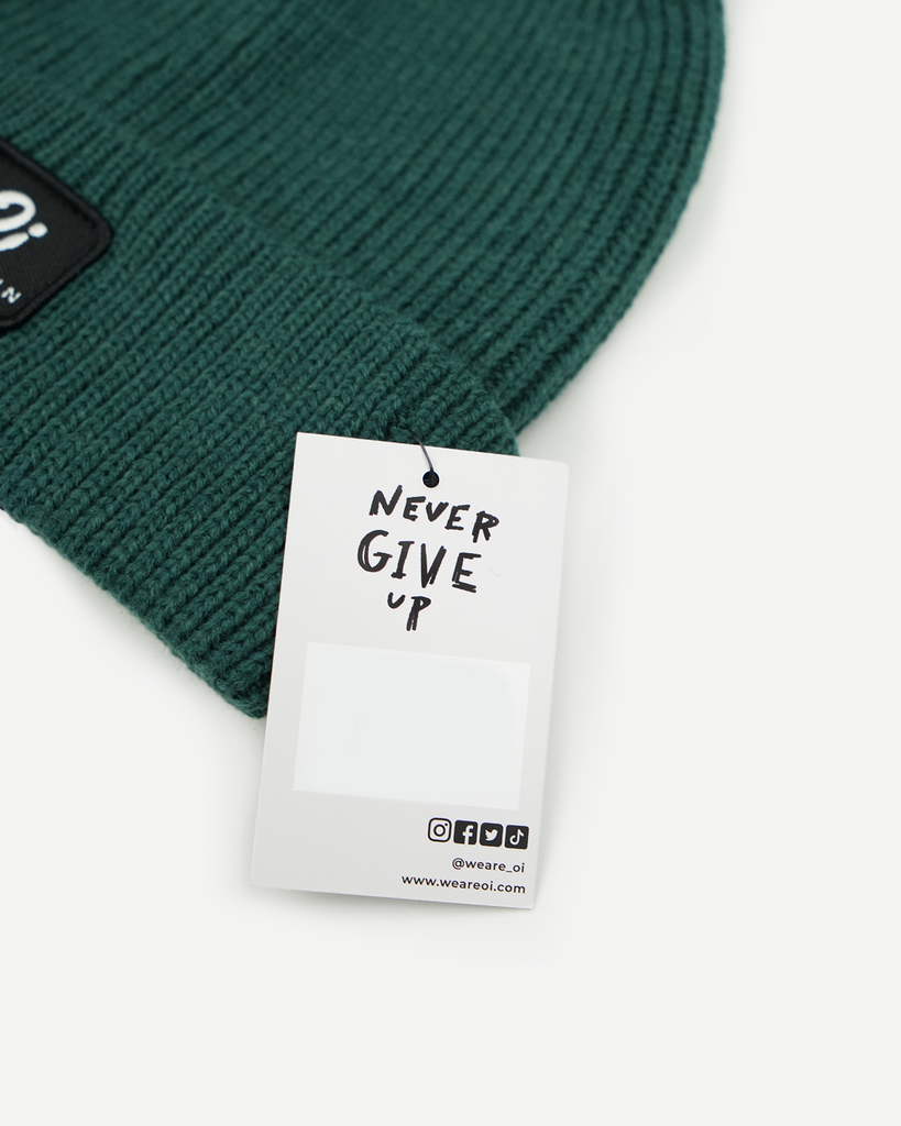 Green thermal beanie hat, cosy knitted winter cap, unisex warm accessory.