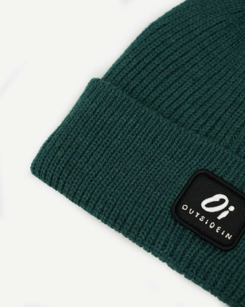 Green thermal beanie hat, cosy knitted winter cap, unisex warm accessory.