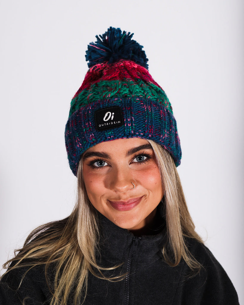 Retro Pop Pom hat with partial faux shearling lining and acrylic knit