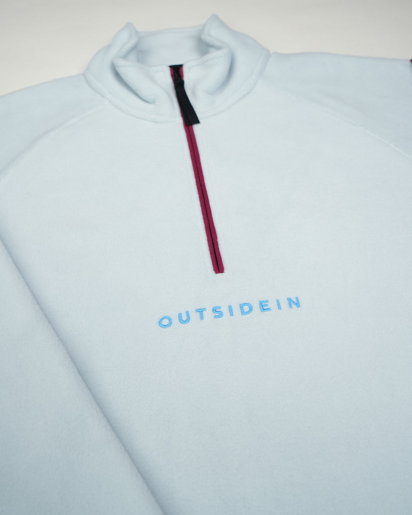 Unisex Light Blue Canyon Fleece with 1/4 zip and adjustable toggle fastening