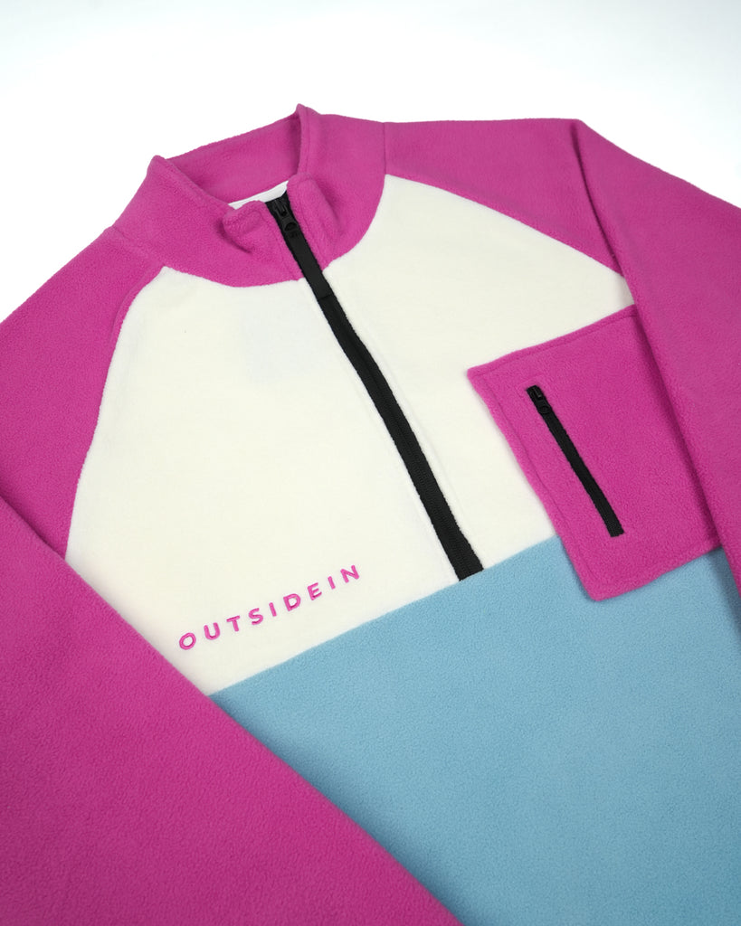 Unisex magenta cream fleece with quarter zip, front pocket and toggle detail