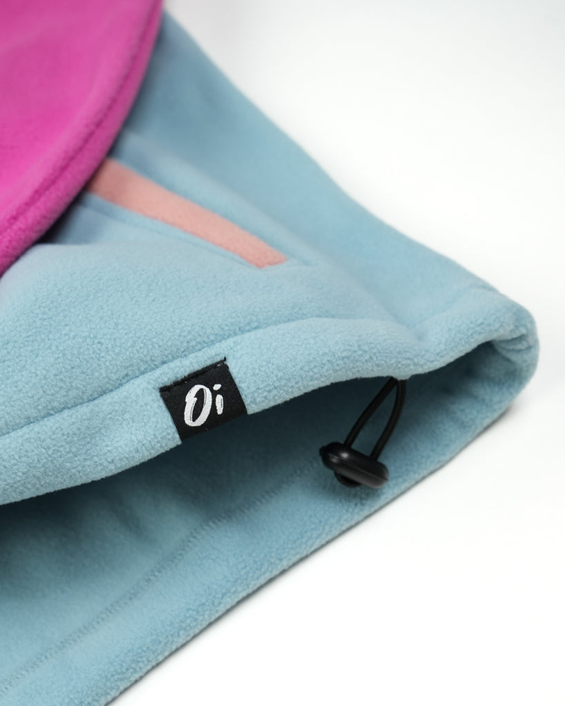 Unisex magenta cream fleece with quarter zip, front pocket and toggle detail