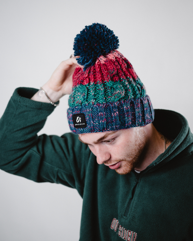 Retro Pop Pom hat with partial faux shearling lining and acrylic knit