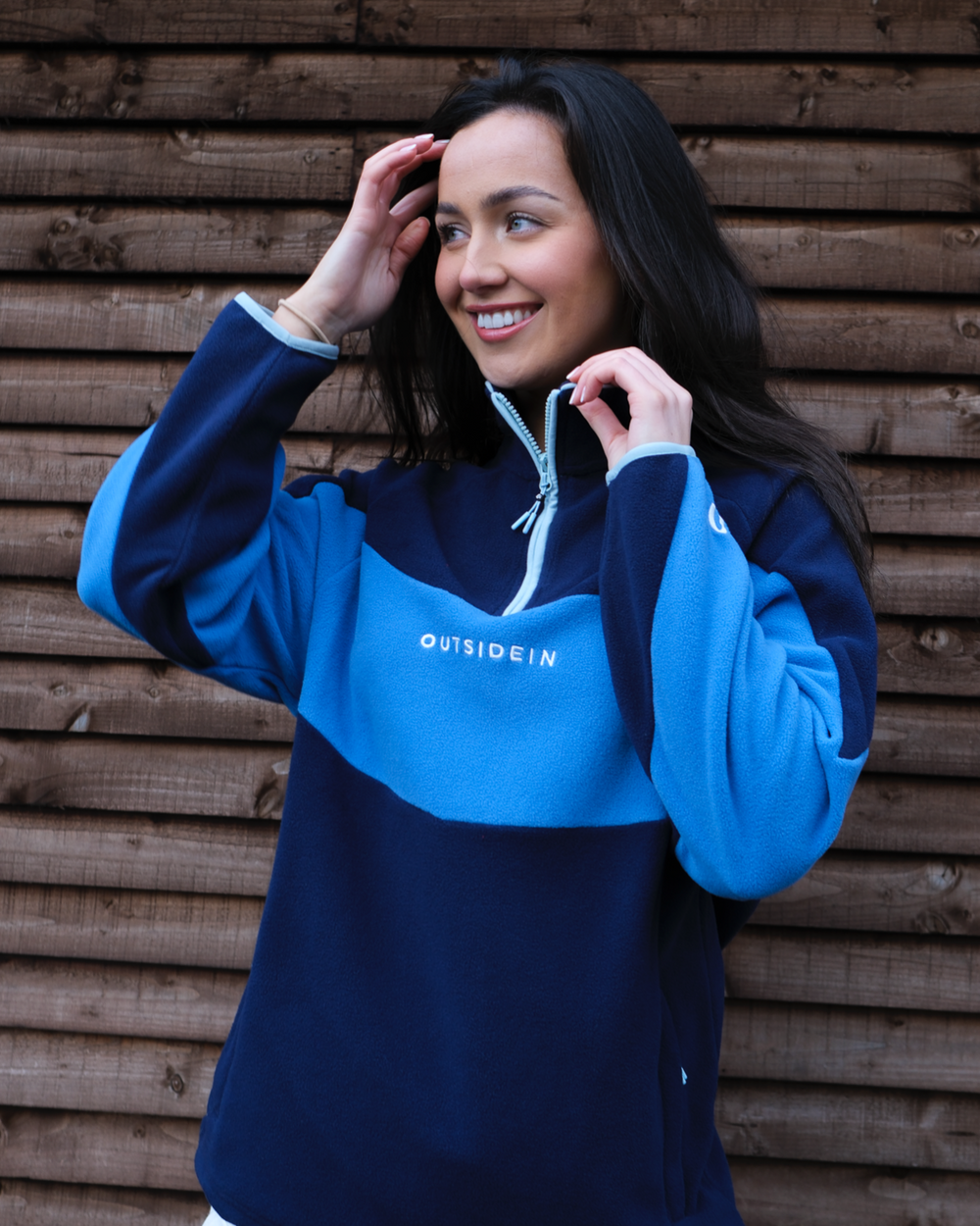 Model wearing OutsideIn Atlantic Wave 1/4 Zip Fleece