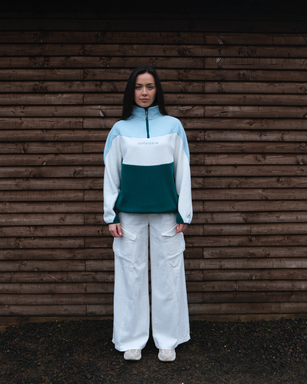 Model wearing OutsideIn Coastal Wave Fleece
