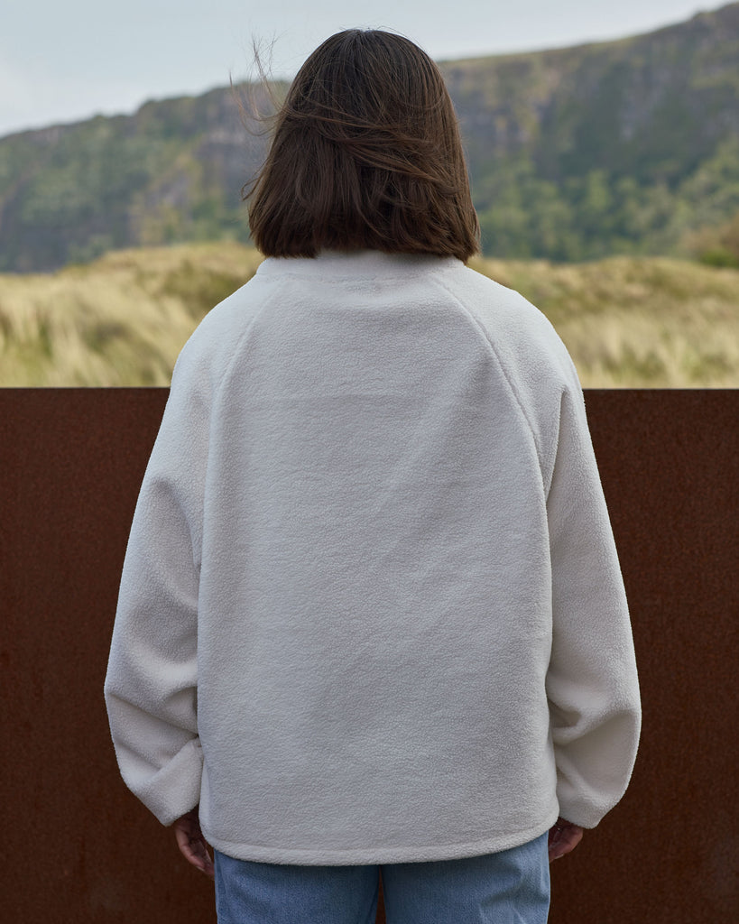 Unisex cream fleece with quarter zip 
