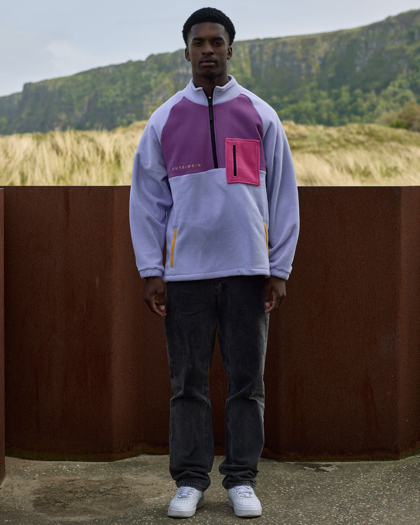 Unisex pink purple fleece with quarter zip, front pocket and toggle detail