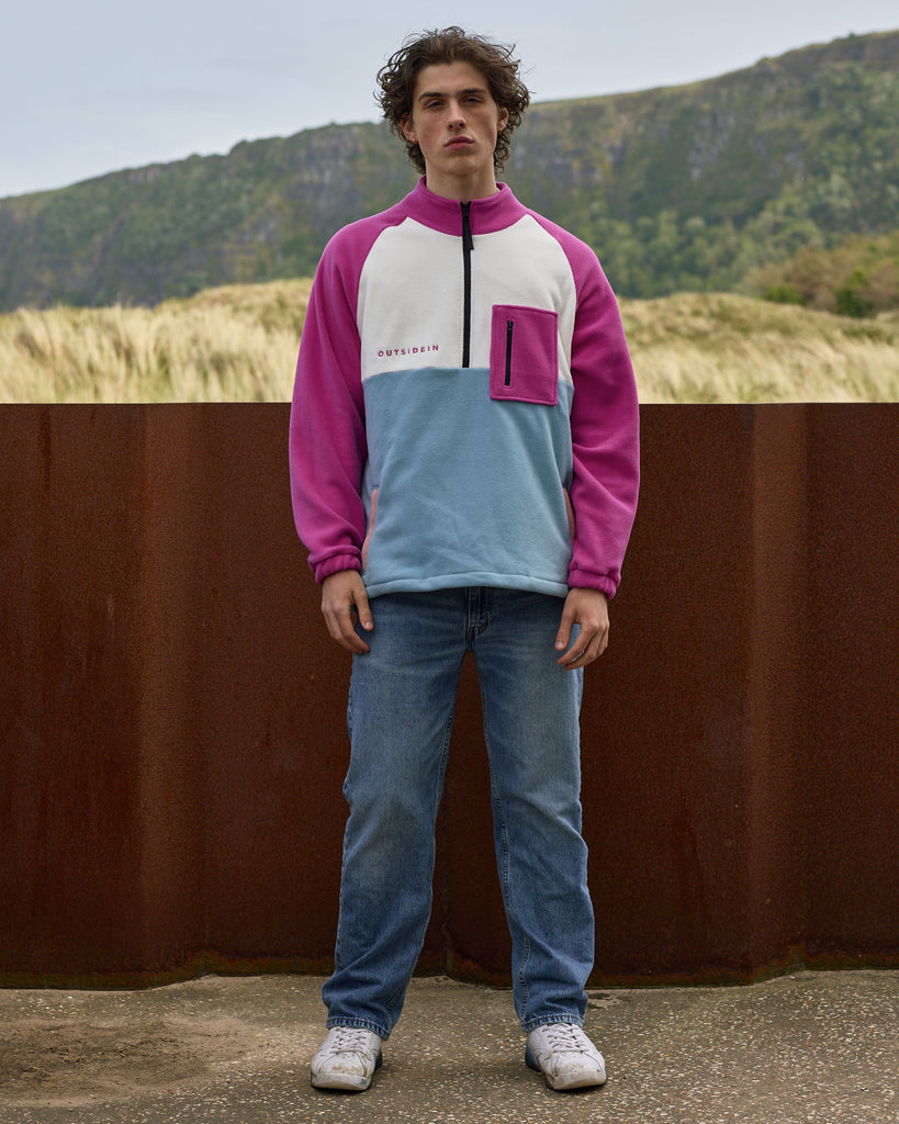 Unisex magenta cream fleece with quarter zip, front pocket and toggle detail