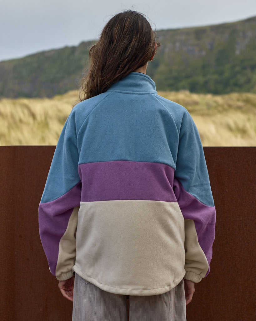 Unisex Aqua Purple Band Fleece with panelled design, toggle fastening, and cosy pockets
