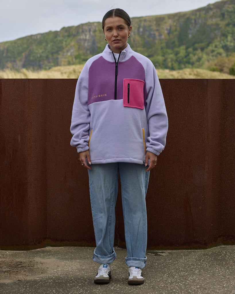 Unisex pink purple fleece with quarter zip, front pocket and toggle detail