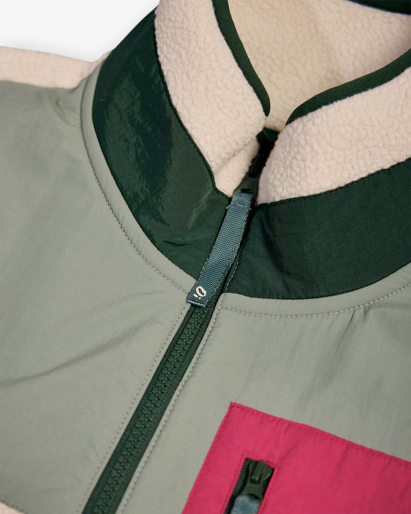 Oatmeal and Sage borg fleece with 1/4 zip, nylon contrast, and side pockets