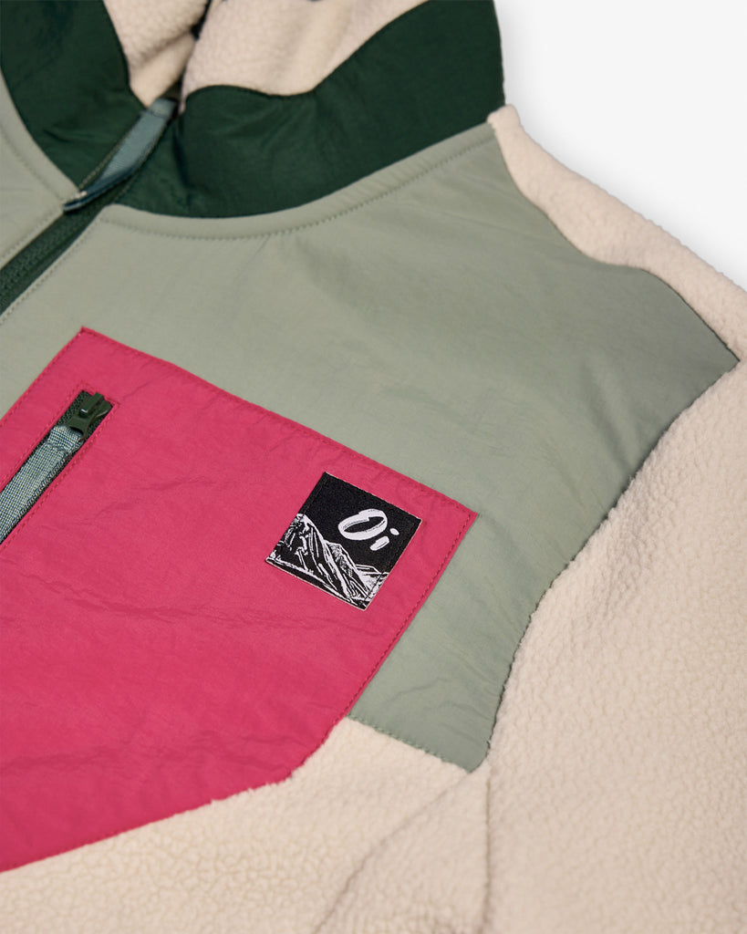 Oatmeal and Sage borg fleece with 1/4 zip, nylon contrast, and side pockets