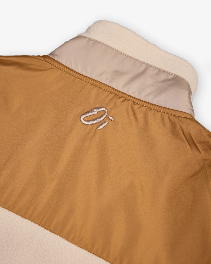 Oatmilk & Walnut borg fleece with 1/4 zip, nylon contrast, and side pockets