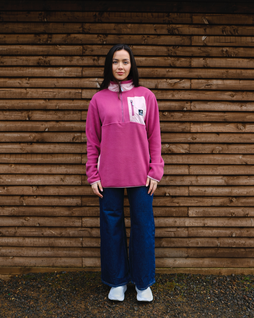 Model wearing OutsideIn Berry & Rose Signature Pocket Fleece