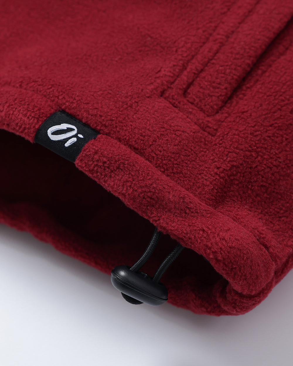 OutsideIn Close-up of a Blue Sage Band fleece jacket with a brand label.