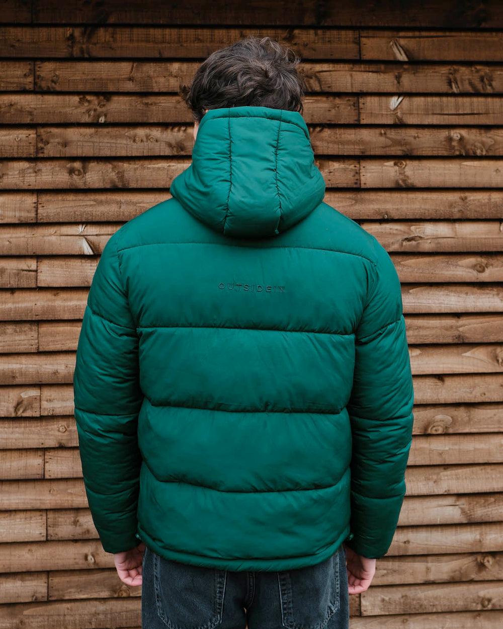 Model wearing OutsideIn Pine Panel Puffer Jacket back view