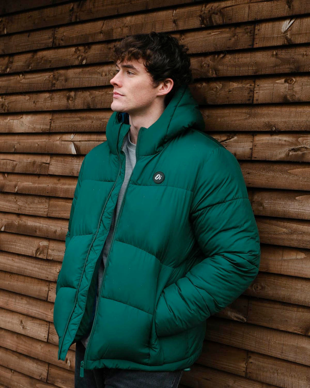 Model wearing OutsideIn Pine Panel Puffer Jacket, side view