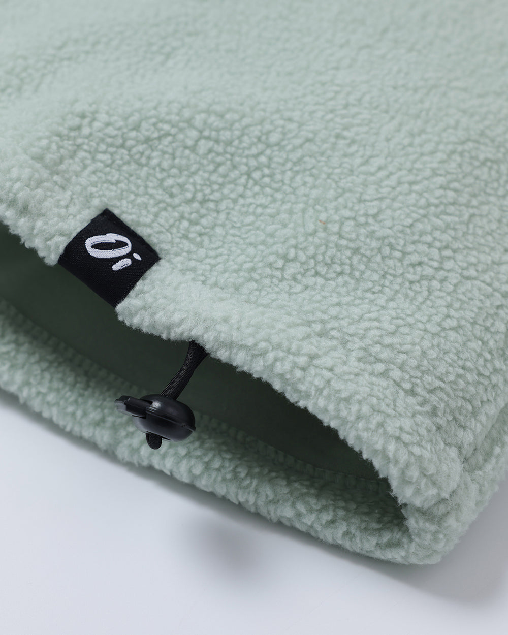 OutsideIn Sage Essential Fleece, close up of tag