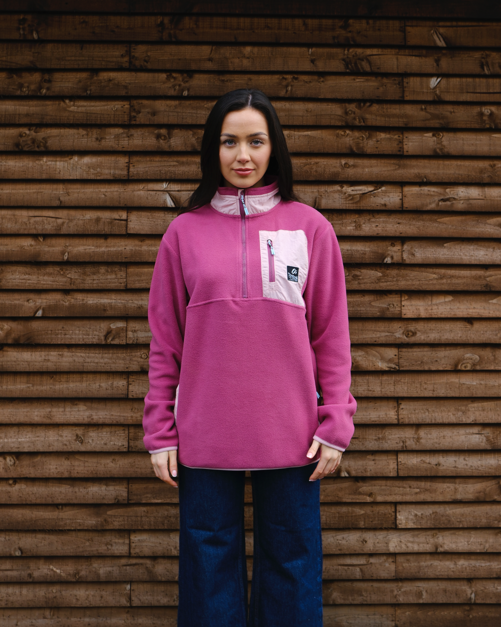 Model wearing OutsideIn Berry & Rose Signature Pocket Fleece 