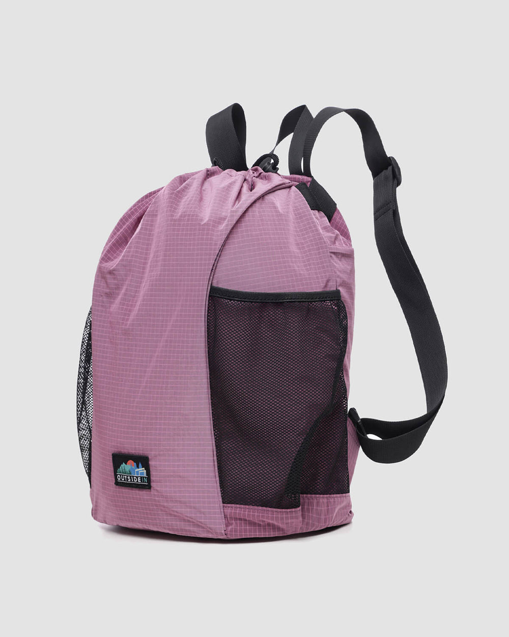 Side view of OutsideIn Pink Black Drawstring Daypack
