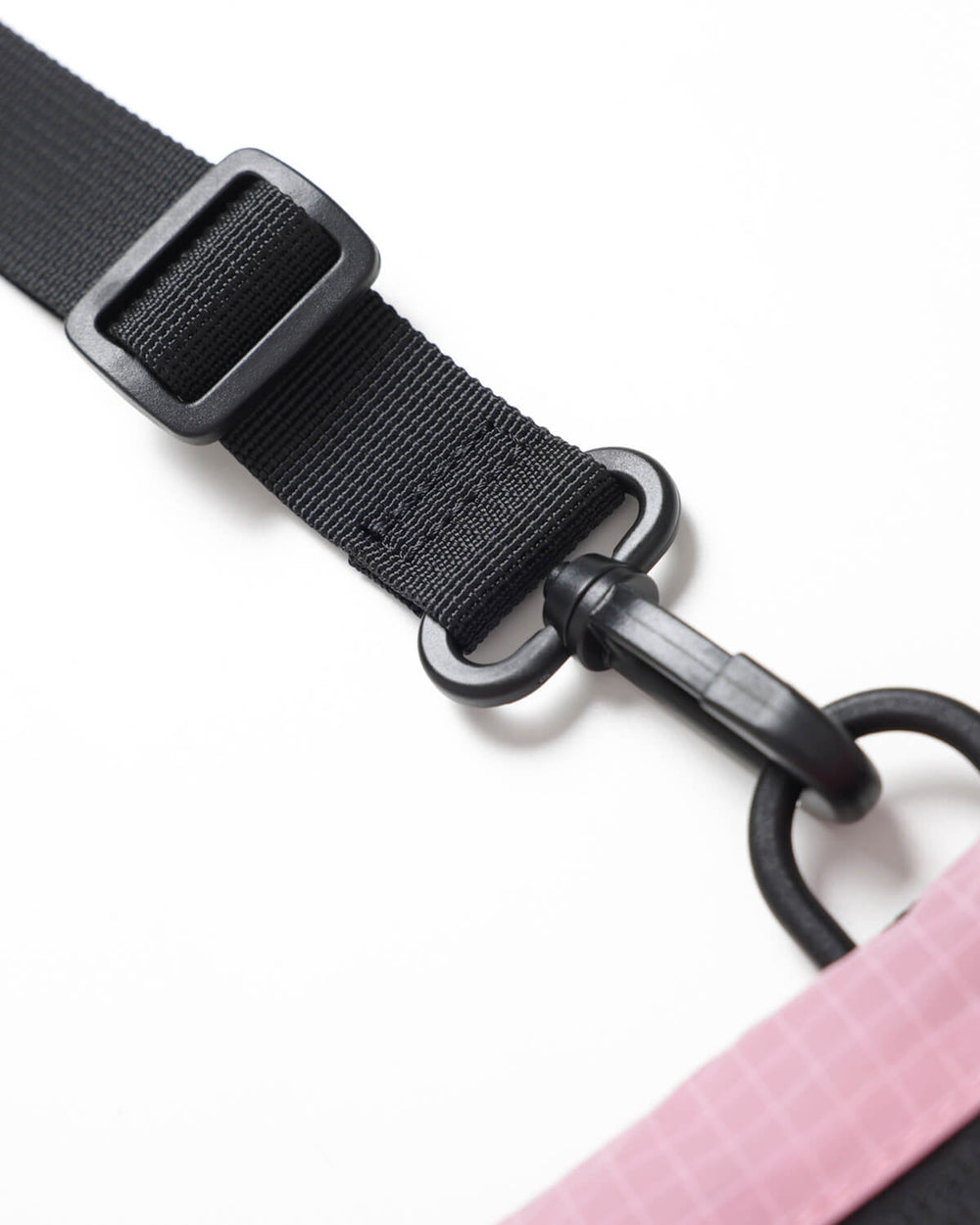 Close up of OutsideIn Pink Grey Lightweight Sling Bag