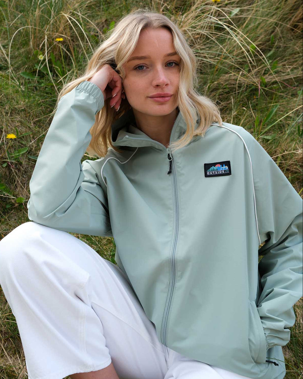 Model wearing OutsideIn Sea Spray Festival Jacket