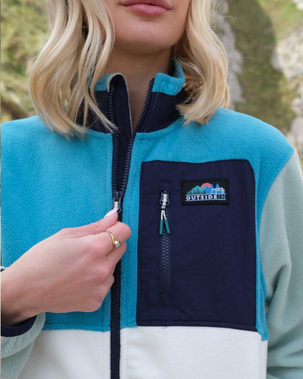 Close up of OutsideIn Sea Glass Signature Pocket Full Zip Fleece
