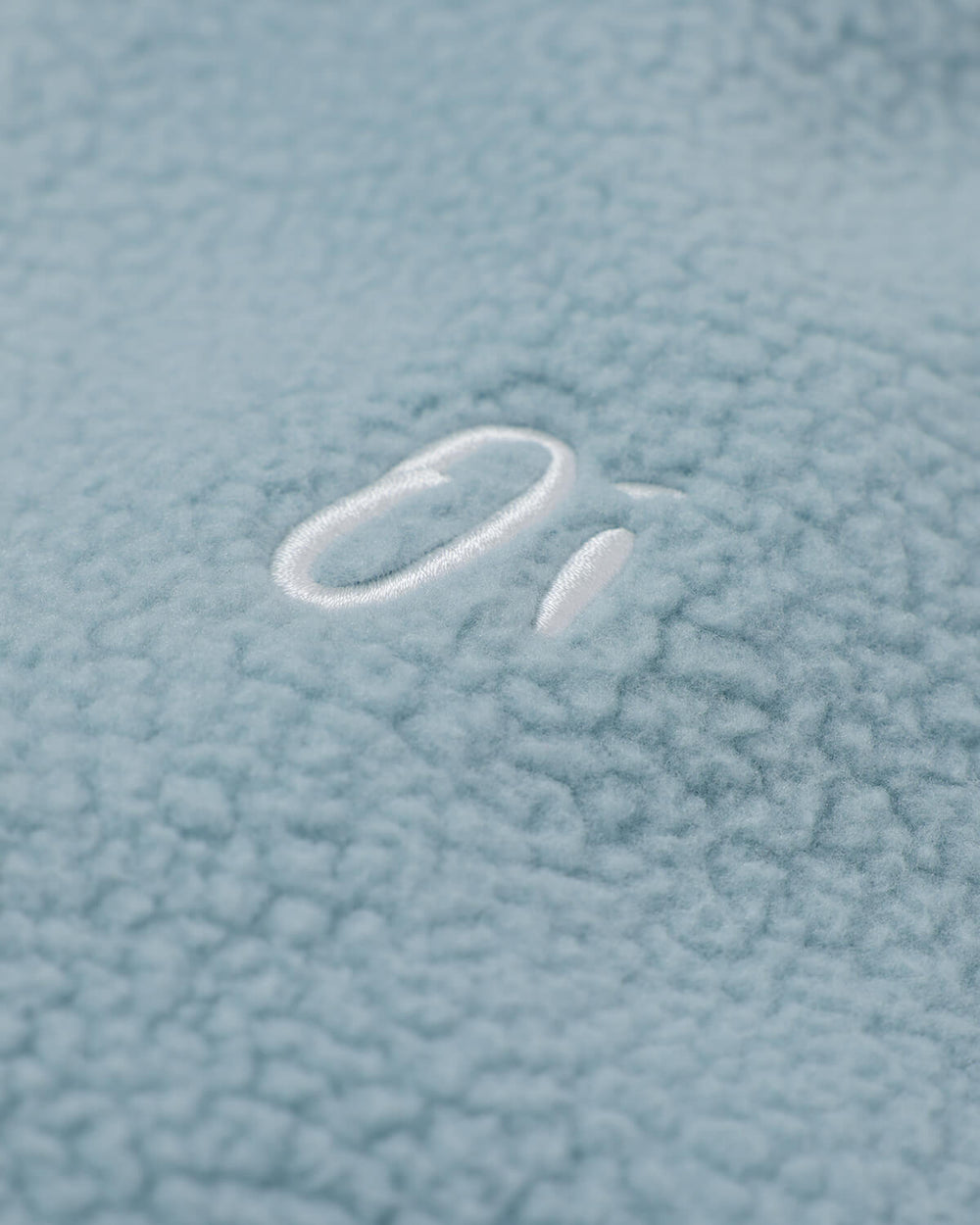 OutsideIn Sterling Blue Essential Fleece logo