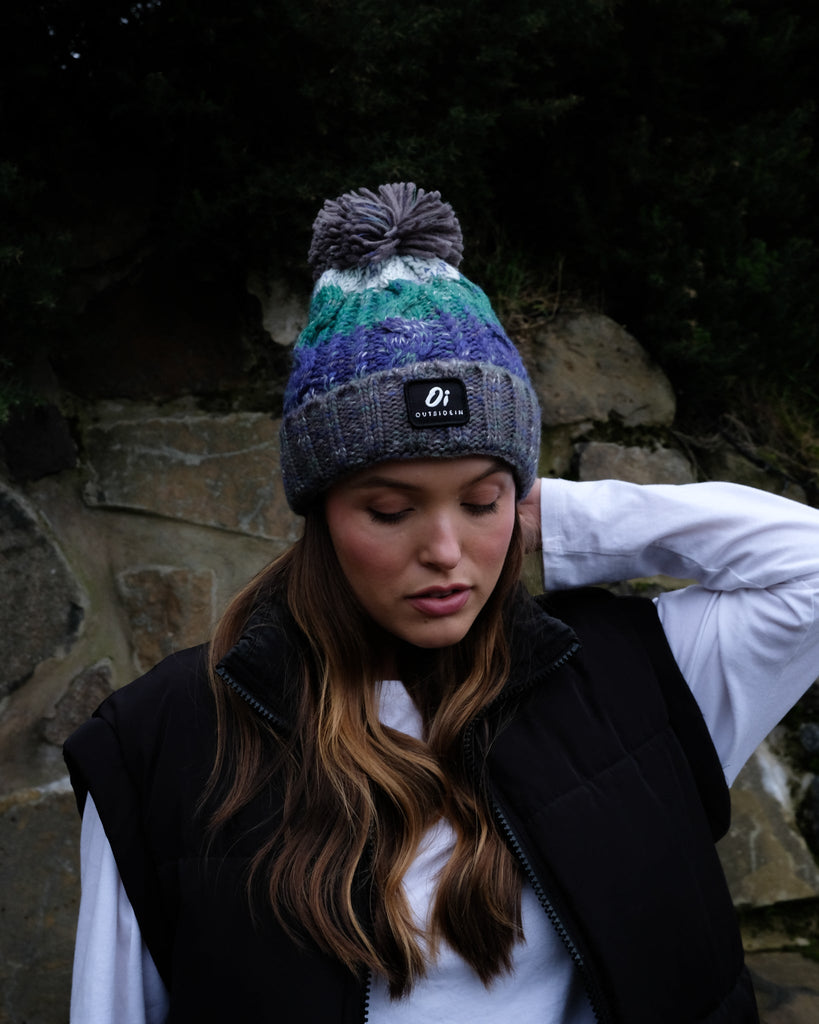 Pom hat in Wild Atlantic colour featuring soft faux shearling base lining and 100% acrylic yarn